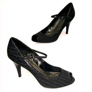 Connie 10 M Heels
Black White Striped
Leather